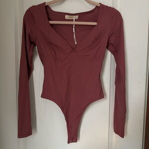 mauve long sleeve body suit